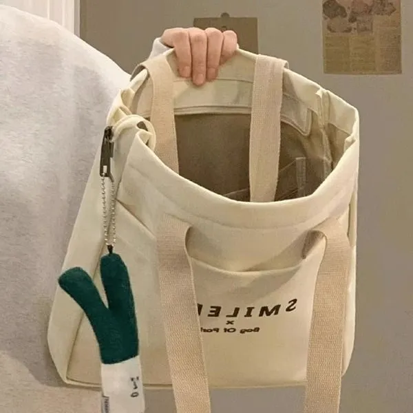 스타일와이 여성 귀여운 흰색 캔버스 팬던트 지퍼 에코백 상세 이미지 3