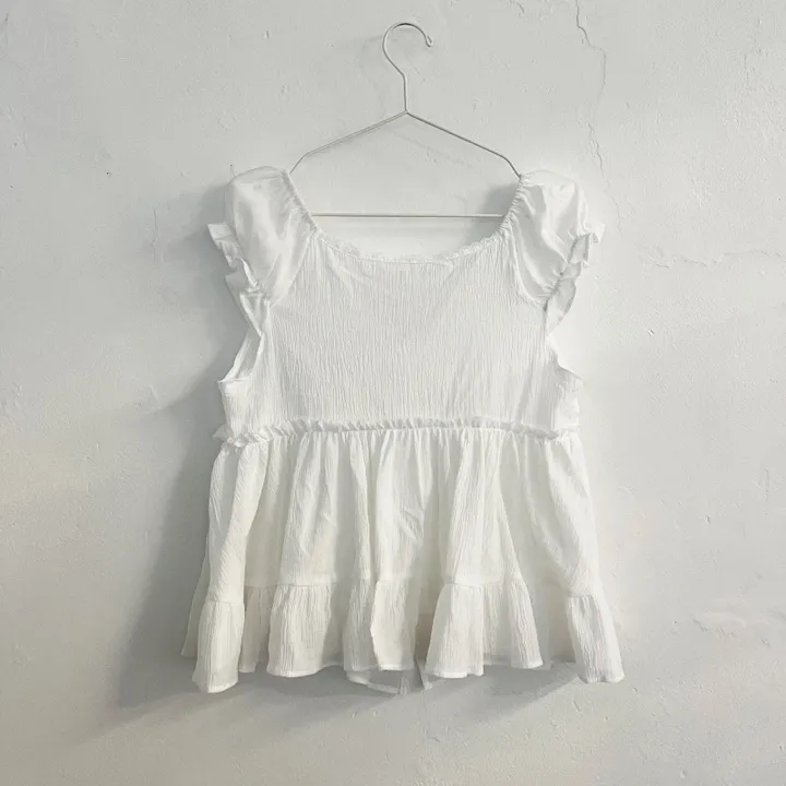 민소매 화이트 색상 이미지-S1L29