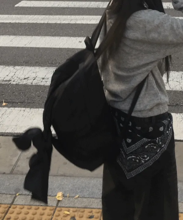 black ribbon back pack