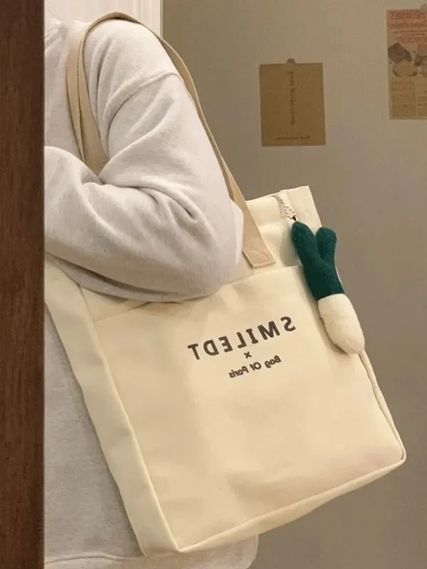 스타일와이 여성 귀여운 흰색 캔버스 팬던트 지퍼 에코백 상세 이미지 1